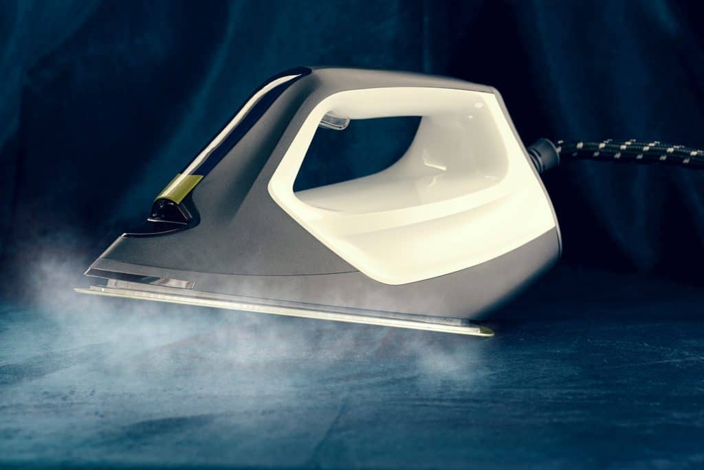 Steam coming out underneath a steam iron